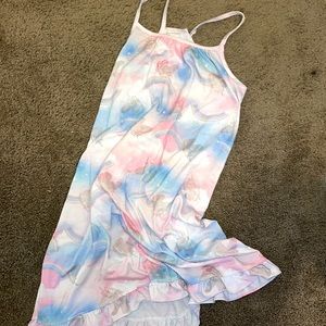 Hi guys my name is Amani , today I have a “ Unicorn gown “ size :XL/TG 14 .